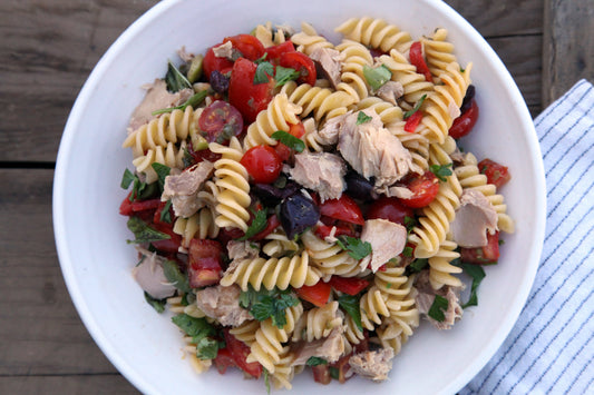 Mediterranean Pasta Salad with Albacore Tuna, Cherry Tomatoes and Olives.
