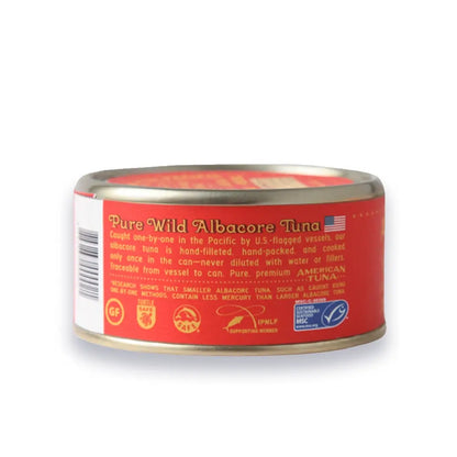 Can of Pure Wild Albacore Tuna with red label on a white background