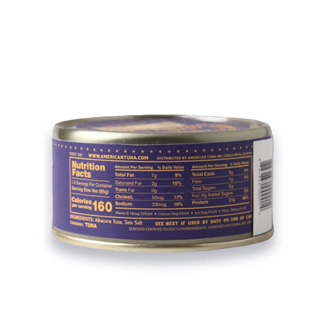 Can of tuna with nutrition facts label on a white background