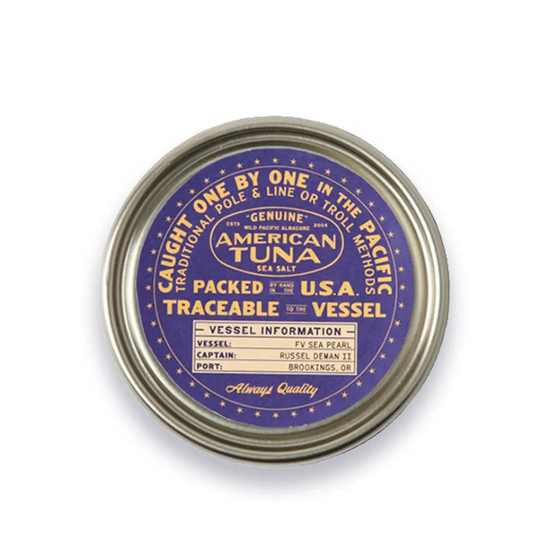 Metal can with purple label on a white background