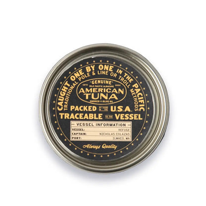 Tuna can lid with branding and text on a white background